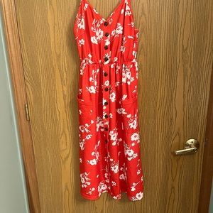 Red floral dress with button detail and pockets